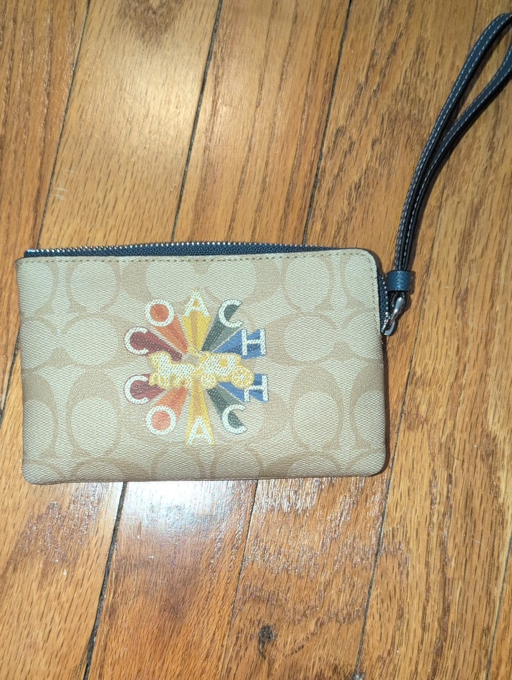 COACH Tan Signature Canvas Wristlet with Multicolor Logo Burst